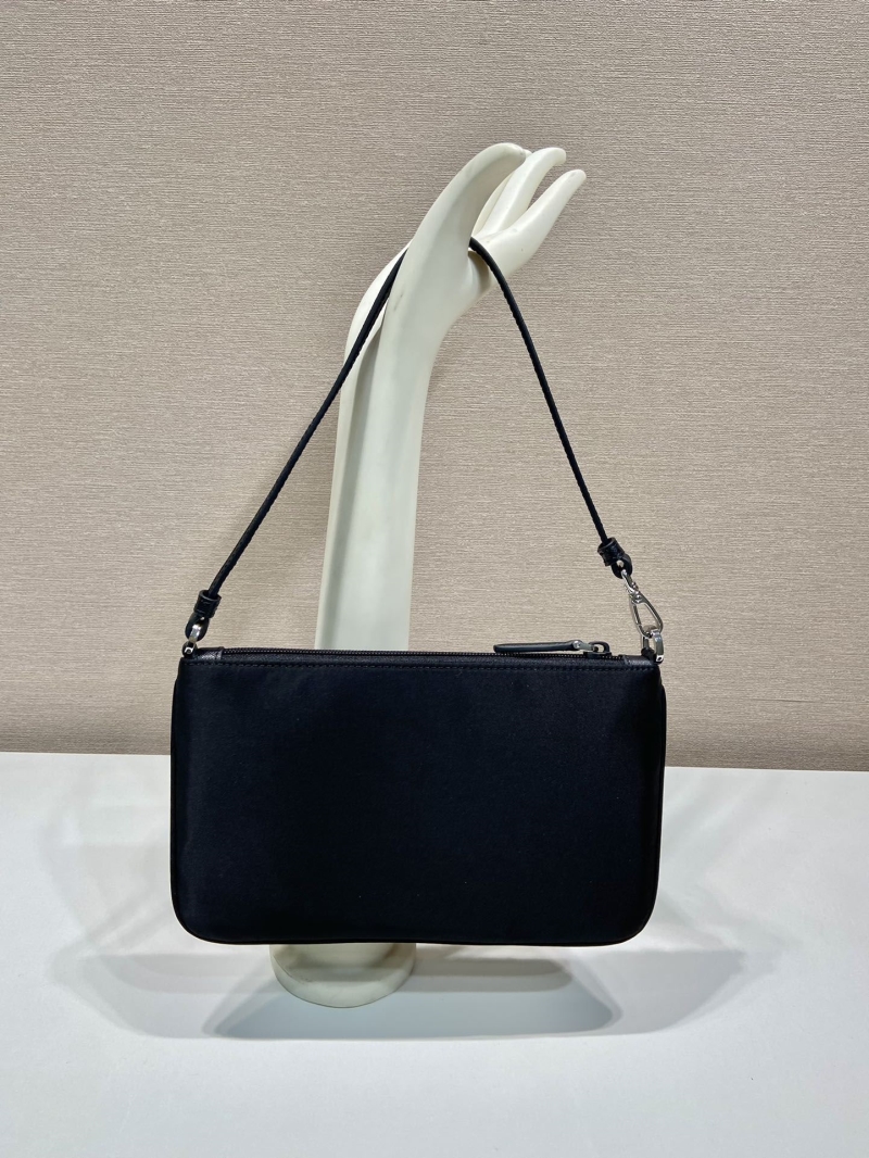 Pra*a clutch bags